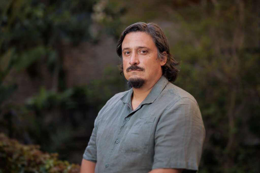 Matías Asún hablando durante una conferencia de Greenpeace sobre justicia ambiental y derechos humanos en América Latina.